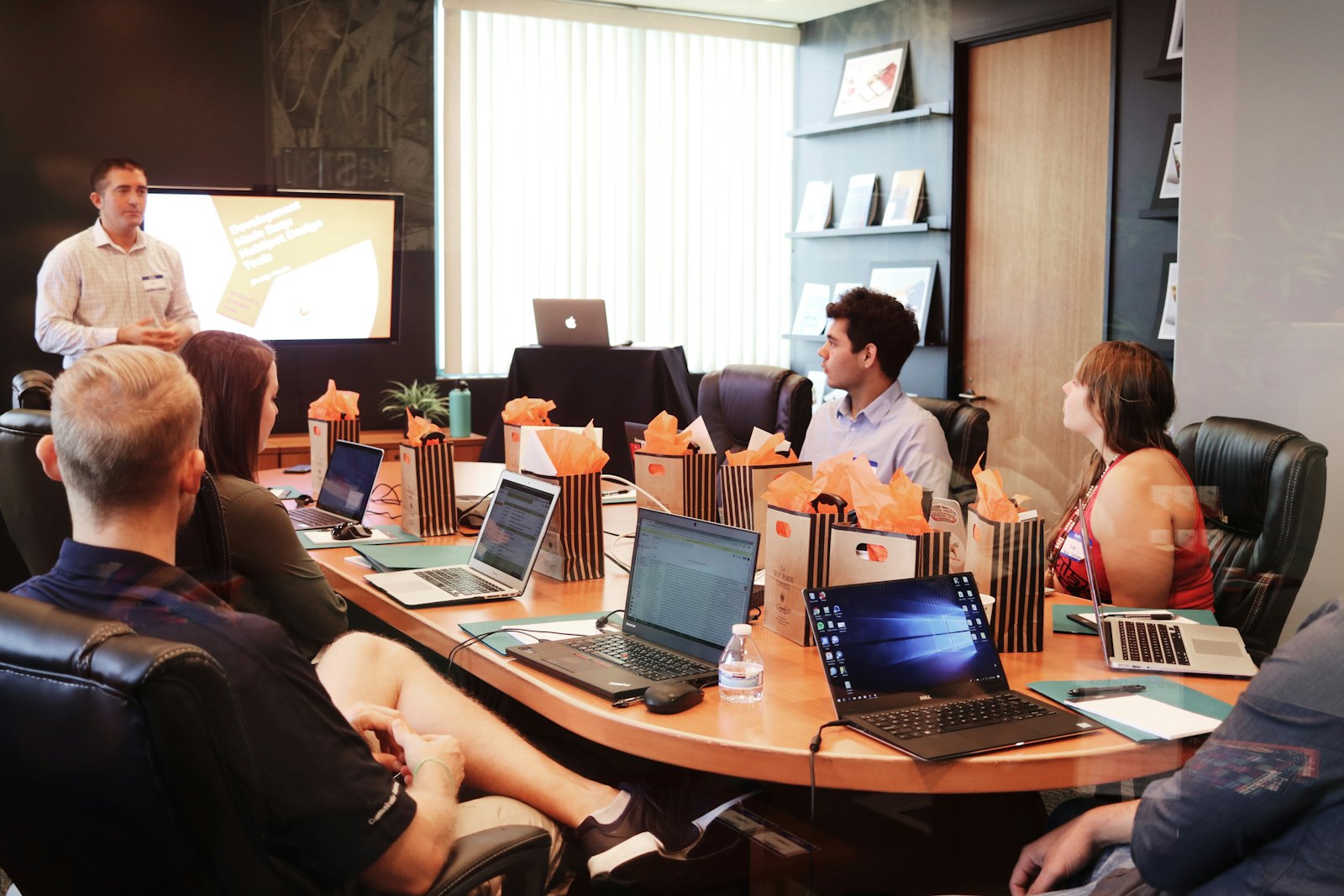 Advisory team presenting in a boardroom